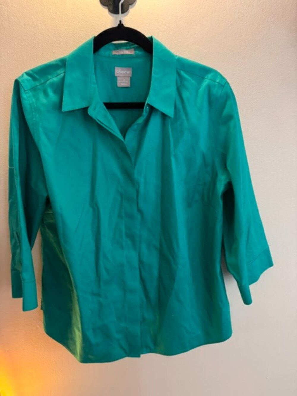 Chico's poplin button-up blouse features versatile 3/4 length cape sleeves